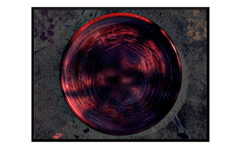 Illustration: birdbath photo digitally manipulated to resemble blood-red tree trunk with spooky shadows